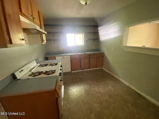 kitchen featuring open shelves, brown cabinetry, dishwasher, baseboards, and under cabinet range hood