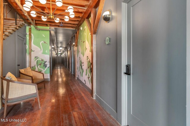 301 S Toulme St Unit 201, Bay Saint Louis, MS 39520 - hallway featuring dark hardwood / wood-style flooring