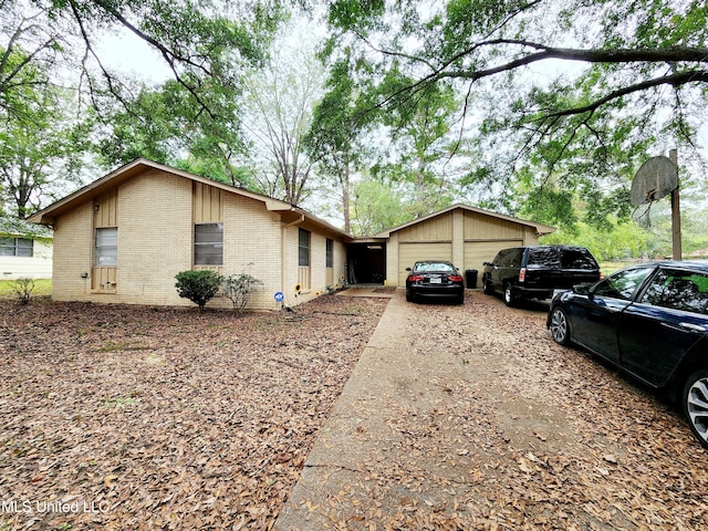 view of side of property with a garage