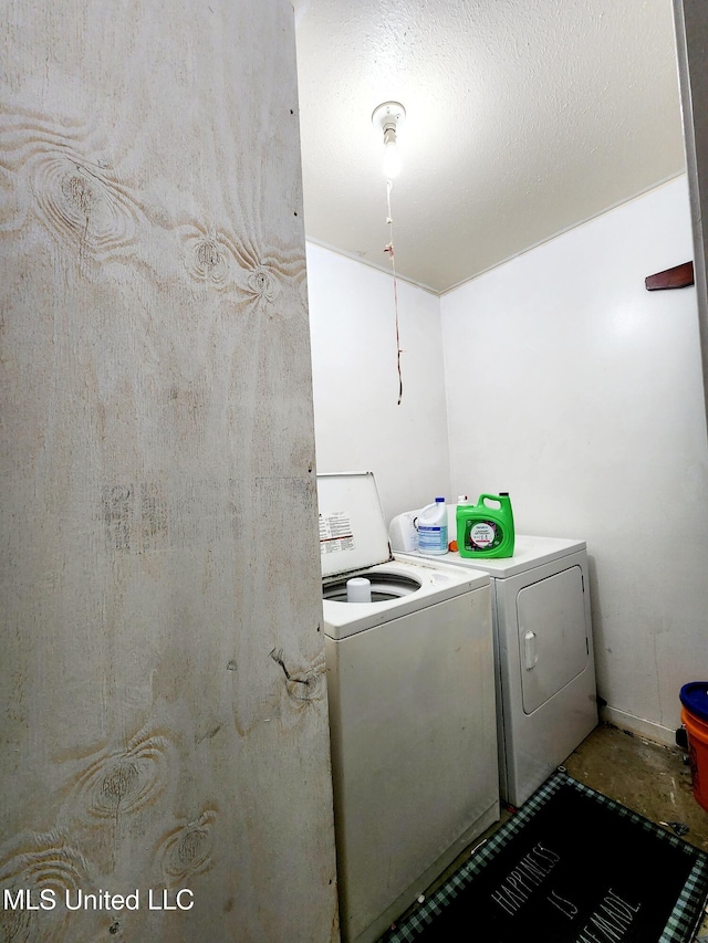 washroom featuring independent washer and dryer