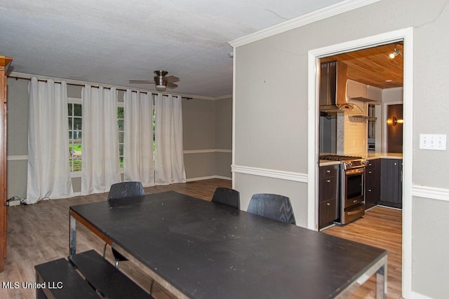 1777 Brecon Dr, Jackson, MS 39211 - dining area featuring wood finished floors, ceiling fan, and crown molding