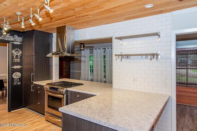 1777 Brecon Dr, Jackson, MS 39211 - kitchen with range hood, stainless steel gas range oven, light wood-style floors, dark brown cabinetry, and wooden ceiling