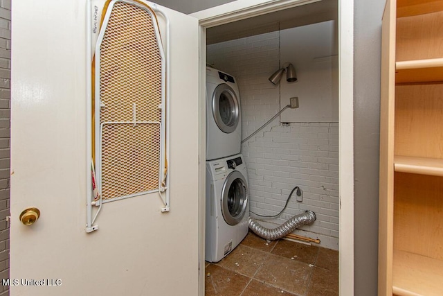 1777 Brecon Dr, Jackson, MS 39211 - laundry room featuring stacked washer / drying machine