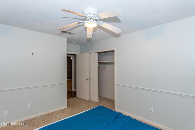 1777 Brecon Dr, Jackson, MS 39211 - unfurnished bedroom with carpet floors, a closet, baseboards, and ceiling fan