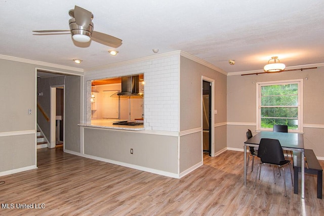1777 Brecon Dr, Jackson, MS 39211 - living room featuring crown molding, wood finished floors, a ceiling fan, stairway, and baseboards