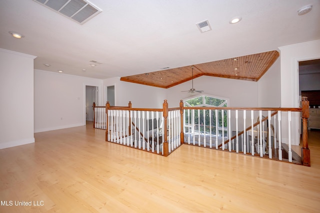 bonus room with ceiling fan, baseboards, visible vents, and wood finished floors