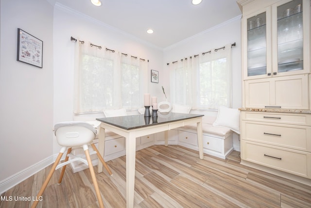 home office featuring baseboards, recessed lighting, ornamental molding, and light wood-type flooring