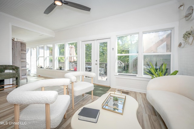 sunroom featuring french doors