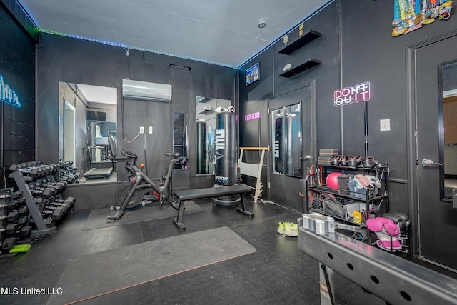 gym with an AC wall unit