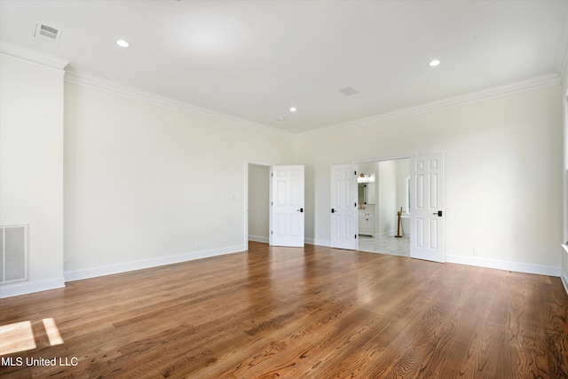 1594 Victoria Rd, Byhalia, MS 38611 - unfurnished bedroom featuring ornamental molding, wood finished floors, and recessed lighting