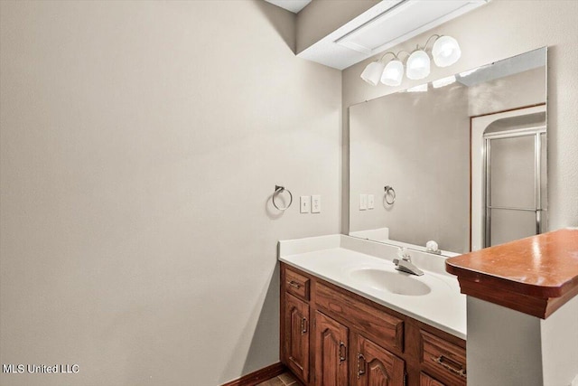 bathroom featuring vanity and walk in shower