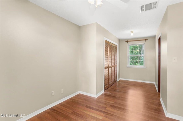 interior space with hardwood / wood-style floors and ceiling fan