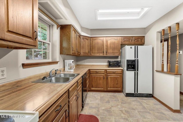 kitchen featuring black appliances and sink