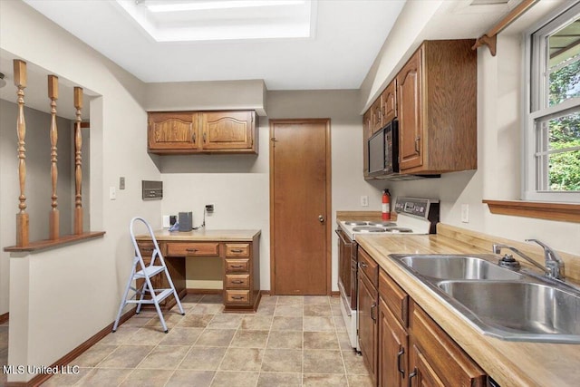 kitchen featuring sink and electric stove