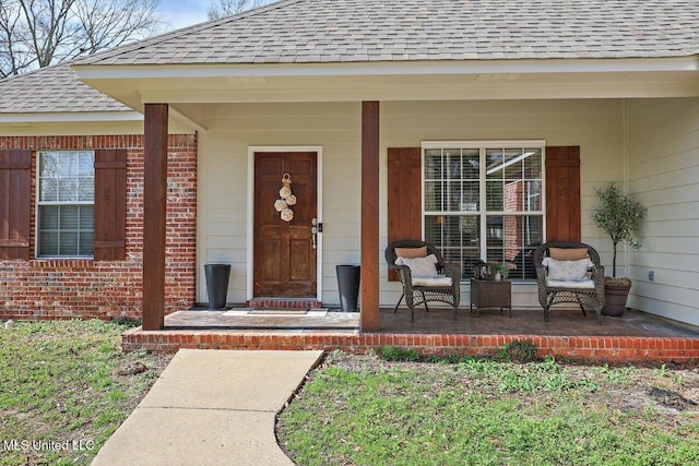 doorway to property featuring covered porch