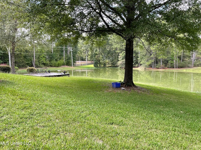 view of yard with a water view