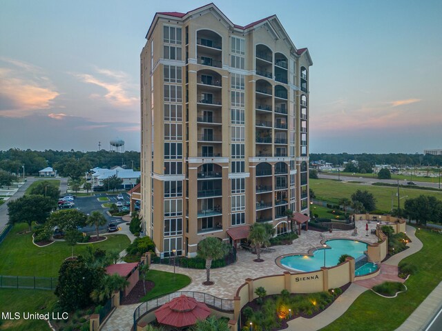 view of property at dusk