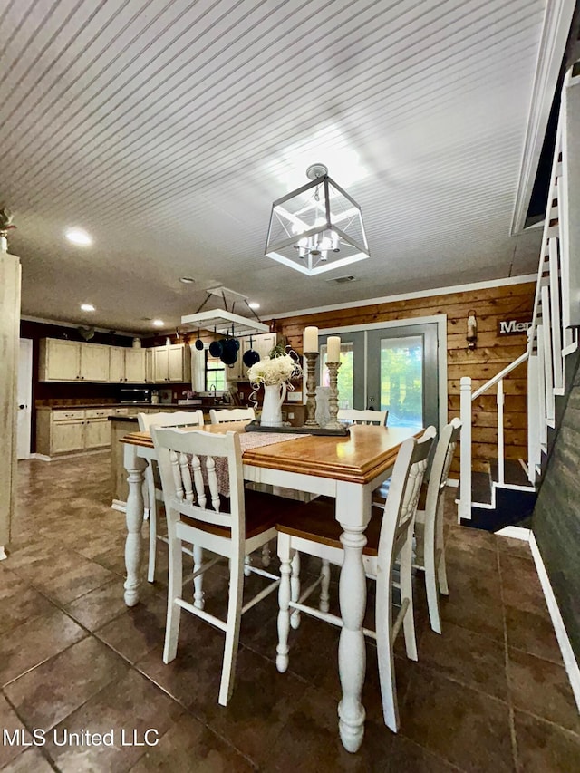 31019 N 19th Hwy, West, MS 39192 - dining area with wooden walls, baseboards, and stairway