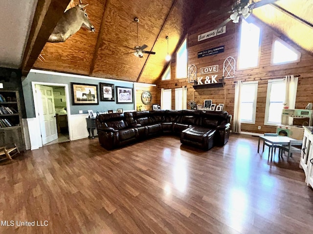 31019 N 19th Hwy, West, MS 39192 - living area with wooden walls, wood finished floors, ceiling fan, and high vaulted ceiling