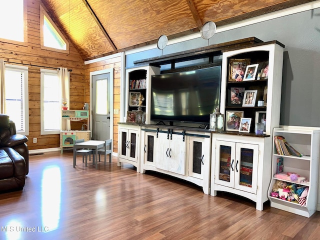 31019 N 19th Hwy, West, MS 39192 - living area featuring wood walls, visible vents, dark wood finished floors, vaulted ceiling, and wood ceiling