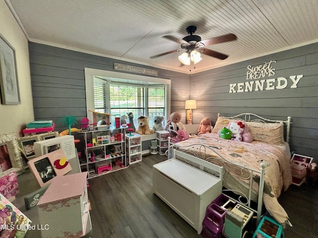 31019 N 19th Hwy, West, MS 39192 - bedroom featuring wood walls, dark wood-style flooring, and a ceiling fan