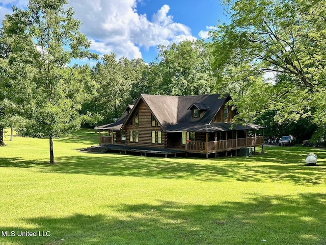 31019 N 19th Hwy, West, MS 39192 - rear view of property featuring a deck, log exterior, and a lawn