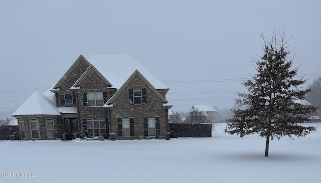 traditional home with brick siding