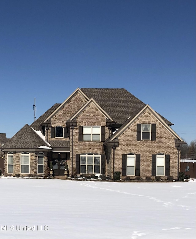 view of front of property with brick siding