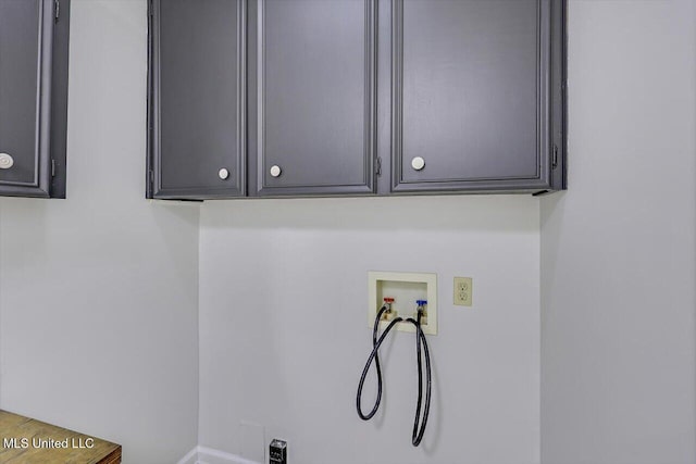 722 SE 1st St, Magee, MS 39111 - laundry area featuring washer hookup and baseboards