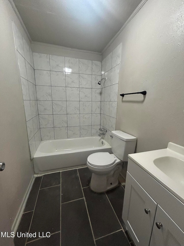 full bathroom featuring ornamental molding, toilet, tile patterned floors, vanity, and tiled shower / bath combo