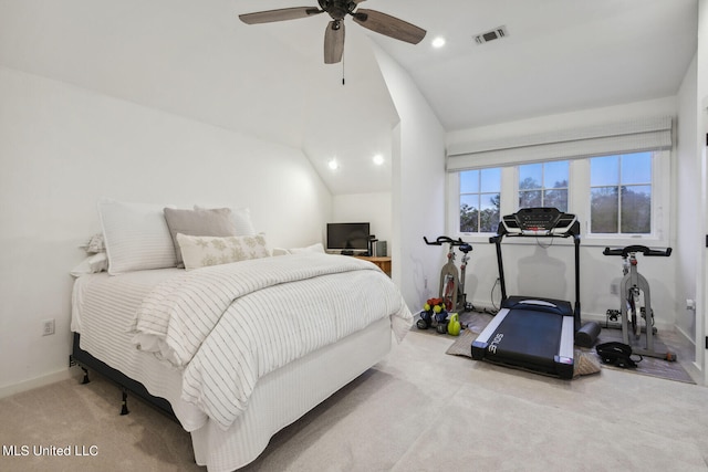 carpeted bedroom featuring vaulted ceiling and ceiling fan