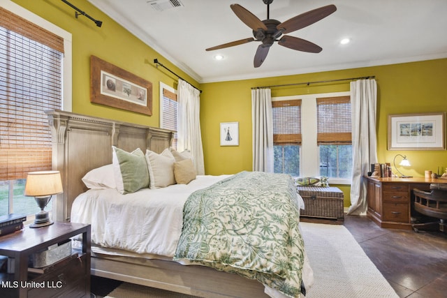 bedroom featuring dark tile patterned flooring, ceiling fan, and ornamental molding