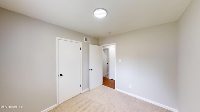 1384 Whitworth Cv, Southaven, MS 38671 - unfurnished bedroom featuring carpet flooring, baseboards, and a closet