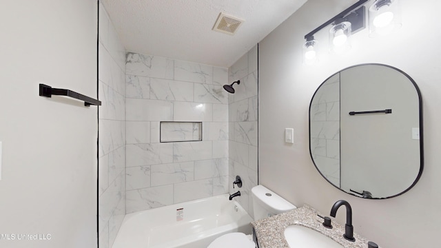 1384 Whitworth Cv, Southaven, MS 38671 - bathroom with toilet, washtub / shower combination, vanity, and a textured ceiling