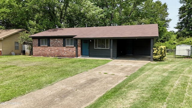 1384 Whitworth Cv, Southaven, MS 38671 - ranch-style home featuring concrete driveway, brick siding, roof with shingles, and an attached carport