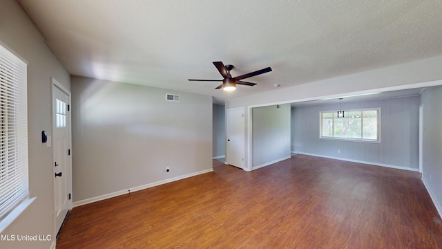 1384 Whitworth Cv, Southaven, MS 38671 - spare room with wood finished floors, a ceiling fan, and baseboards