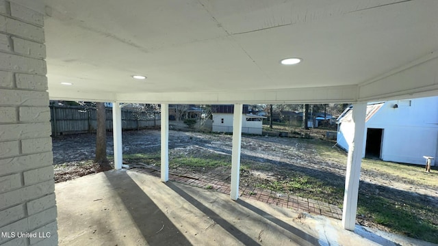 view of patio / terrace featuring fence