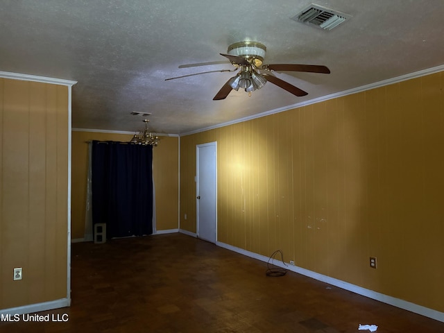 unfurnished room featuring visible vents, crown molding, baseboards, and ceiling fan with notable chandelier