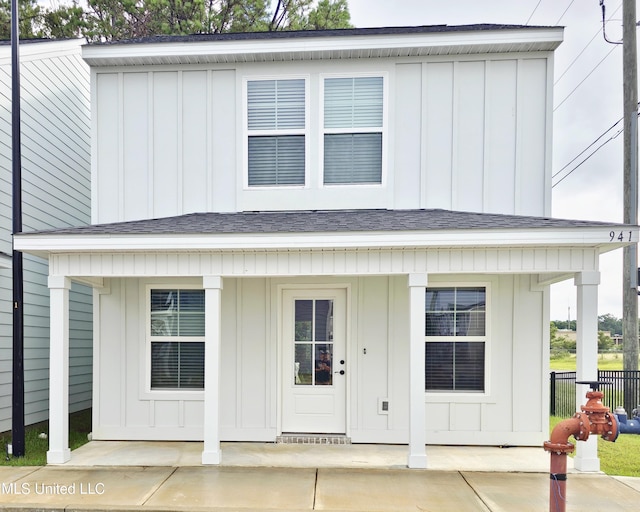 925 Motsie Rd, Biloxi, MS 39532 - view of front of property featuring board and batten siding, covered porch, and roof with shingles