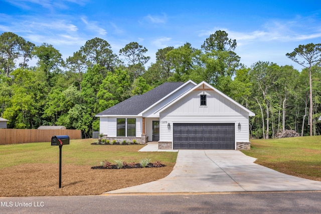 13379 Wash Fayard Rd, Biloxi, MS 39532 - modern inspired farmhouse with concrete driveway, board and batten siding, a garage, and stone siding
