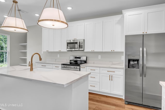 13379 Wash Fayard Rd, Biloxi, MS 39532 - kitchen featuring appliances with stainless steel finishes, a sink, recessed lighting, and white cabinetry