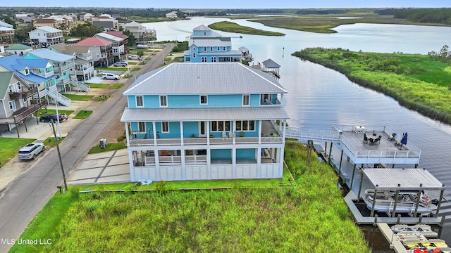 drone / aerial view featuring a water view