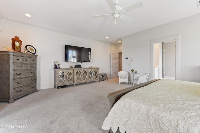 carpeted bedroom featuring crown molding and ceiling fan