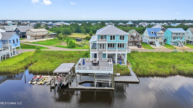 dock area with a water view