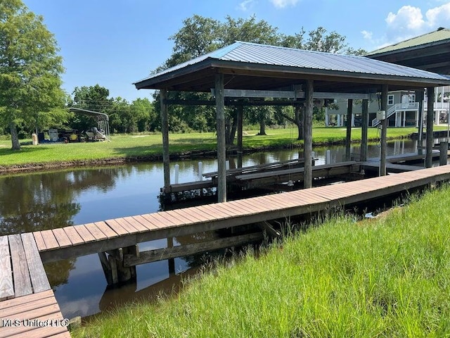 view of dock with a water view