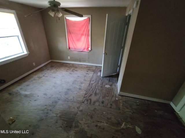 empty room with ceiling fan