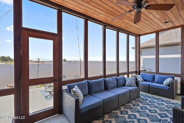 38 Savannah Cir, Brandon, MS 39047 - sunroom featuring a water view, outdoor lounge area, ceiling fan, wooden ceiling, and a wall of windows