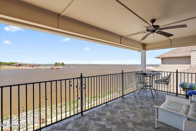 38 Savannah Cir, Brandon, MS 39047 - balcony featuring a ceiling fan and a water view