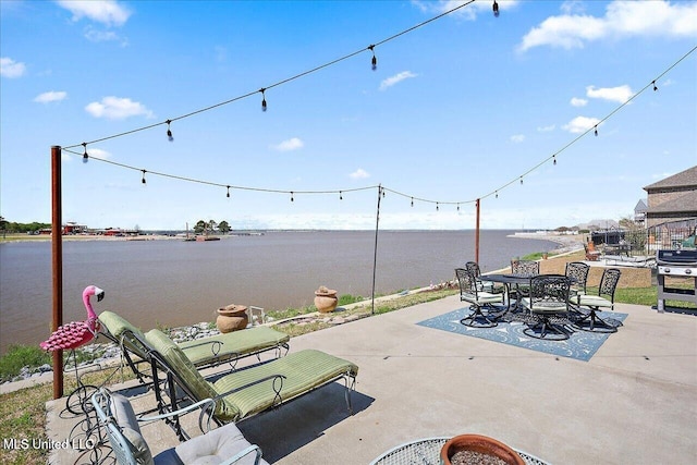38 Savannah Cir, Brandon, MS 39047 - view of patio with a water view, outdoor dining area, and a grill