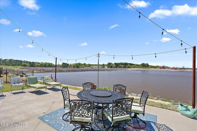 38 Savannah Cir, Brandon, MS 39047 - view of patio / terrace with a water view and outdoor dining space